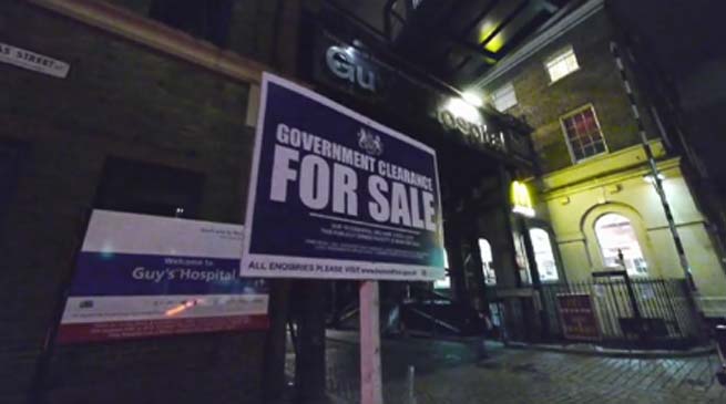 The Space Hijackers are a Situationist-inspired anarchitect collective. Troublemakers with a dapper cut and a razor-edged wit, they saw fit to tackle moves by the UK’s coalition government to privatise bits of the NHS. Their mode of battle? “For Sale” signs as popularised by estate agents.